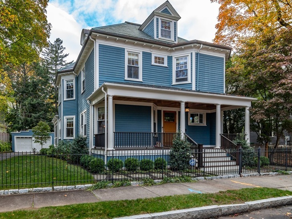 Blue Victorian home with porch at 25 Kimball Terrace Newton
