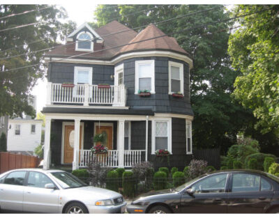 Victorian home at 26 Hobart St Boston with turret and porch