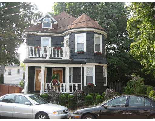 Victorian home at 26 Hobart St Boston with turret and porch