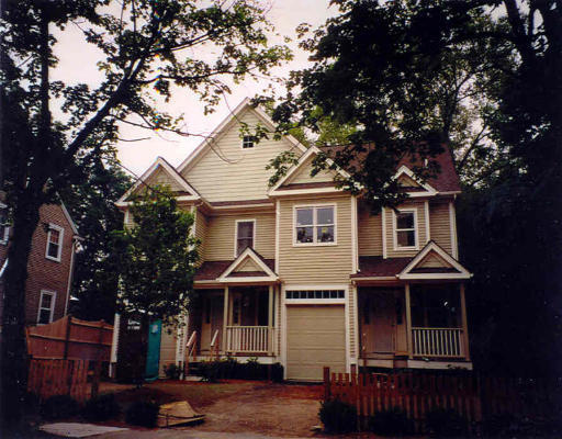 Front exterior view of the 4-bed townhouse at 18 Beaconwood Road in Newton, MA