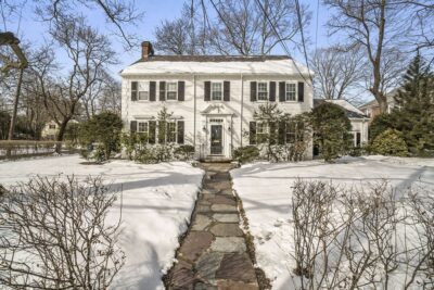 Front exterior of 5-bedroom colonial home at 1019 Centre Street in Newton, MA