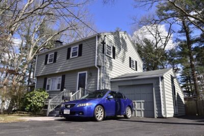 Front exterior of 4-bedroom colonial home at 21 Curran in Randolph, MA