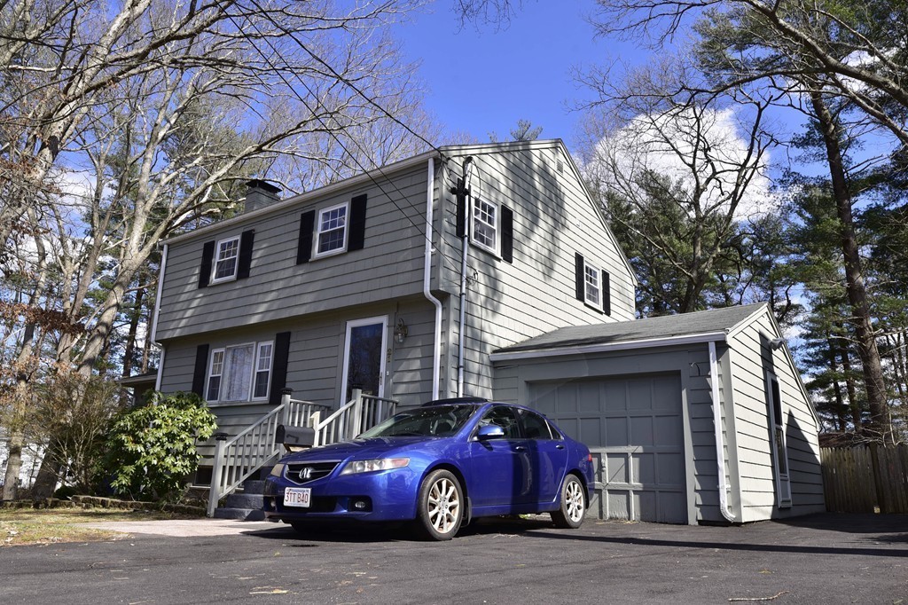 Front exterior of 4-bedroom colonial home at 21 Curran in Randolph, MA