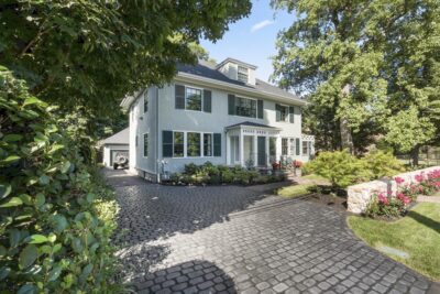 Exterior view of fully renovated 5-bedroom colonial home at 88 Hammond Street in Chestnut Hill, Newton