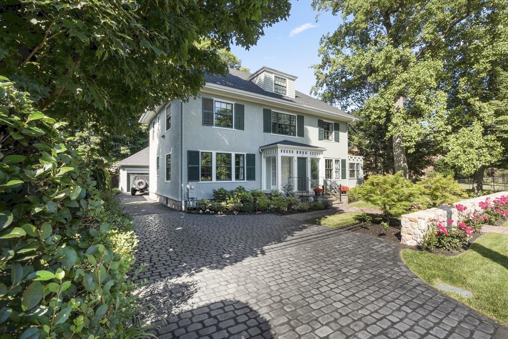 Exterior view of fully renovated 5-bedroom colonial home at 88 Hammond Street in Chestnut Hill, Newton