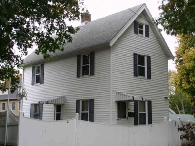 Front view of 2-bedroom colonial farmhouse at 45 Beecher Place in Newton, MA