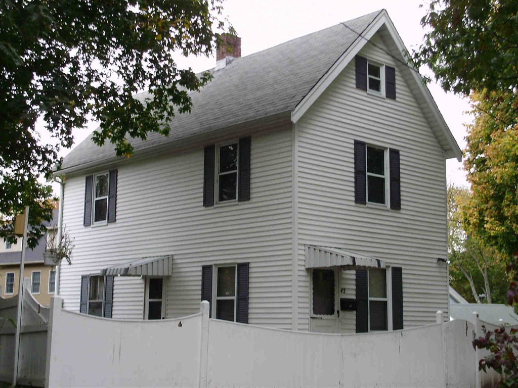 Front view of 2-bedroom colonial farmhouse at 45 Beecher Place in Newton, MA