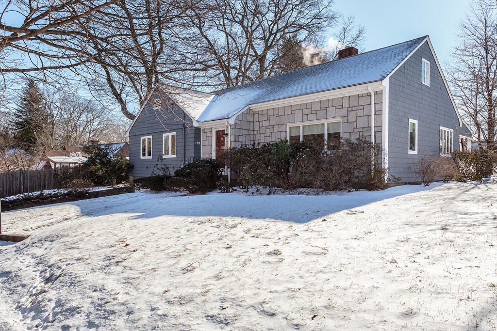 Exterior view of 3-bedroom ranch at 192 Cotton Street in Newton Centre on a snowy day